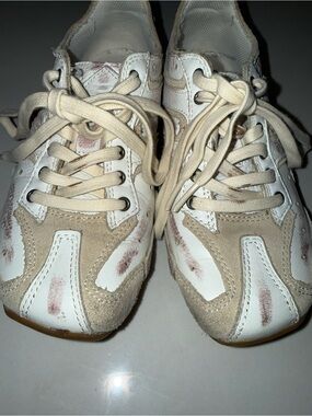 Diesel white sneakers with black and red logo accents